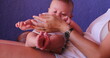 © Marco - Holding newborn baby infant boy first months of life