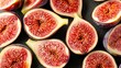   Figs halved and arranged on black plate