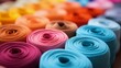 Close-Up of Various Colored Rolls of Fabric