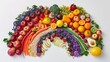 vegan rainbow, make of fruits and vegetables in a white background