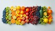 fruits and vegetables arranged by color in a white background
