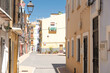 View to beautiful Villajoyosa street with multi-colored houses. Villajoyosa -coastal town in Alicante Province, Valencian Community, Spain, by Mediterranean Sea