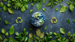 Celebrating Earth Day With a Globe Surrounded by Green Leaves and Recycling Symbols on a Dark Background