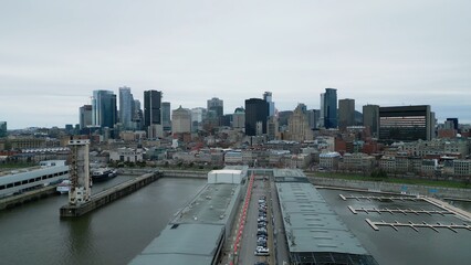 Canvas Print - Flight along the skyline of Montreal Canada aerial view - travel photography by drone