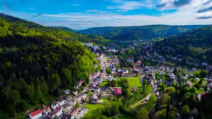 Wall Mural - Aerial view of the city Bad Herrenalb, Germany in spring on a sunny morning day	
