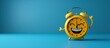 Cheerful yellow funny alarm clock on blue background, close-up morning time reminder, banner, copy space