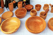 Wooden bowls and other handmade kitchenware on a market