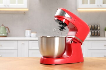 Wall Mural - Modern red stand mixer on wooden table in kitchen, space for text