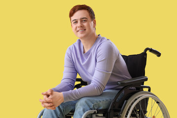 Sticker - Young man in wheelchair on yellow background