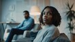 © MCCreative - African American Woman in Focus, Partner Out of Focus, Counseling Session