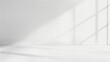 © Isaac Studio - empty room with white walls with window shadow