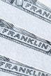 Macro image with Franklin description on the one hundred US Dollar bill. Vertical image.