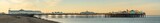 Fototapeta Krajobraz - Panoramic view of the Brighton Pier at sunrise. England