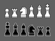 Black and white set of chess pieces in a flat style, arranged on a gray background