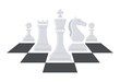 A set of white chess pieces with a black chessboard pattern