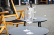 Champane glasses after a celebration, on an outside table