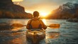 Rear view of man meeting sunset on kayaks on lake with beautil landscape in backgrounds