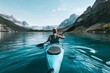 Rear view of kayaker woman with paddle kayak on beautiful landscape. Kayaking, canoeing, paddling
