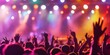 © gunzexx png and bg - An electric atmosphere of a live music concert with a crowd of people enjoying under vibrant stage lights
