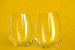 Glasses on yellow background