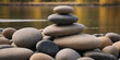Rock balancing banner. Stones piled in balanced stacks 