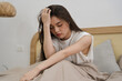 © Q88 - Portrait of beautiful young Asian girl at home