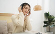 © Q88 - Portrait of beautiful young Asian girl at home