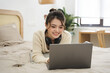 © Q88 - Portrait of beautiful young Asian girl at home