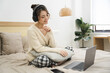 © Q88 - Portrait of beautiful young Asian girl at home