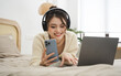© Q88 - Portrait of beautiful young Asian girl at home