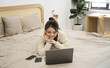 © Q88 - Portrait of beautiful young Asian girl at home