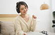 © Q88 - Portrait of beautiful young Asian girl at home