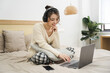 © Q88 - Portrait of beautiful young Asian girl at home