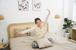 © Q88 - Portrait of beautiful young Asian girl at home
