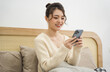 © Q88 - Portrait of beautiful young Asian girl at home