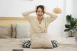 © Q88 - Portrait of beautiful young Asian girl at home