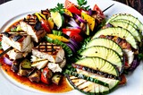 Fototapeta Do przedpokoju - A plate of food with grilled chicken, vegetables, and cucumbers