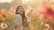 A woman, a Korean is in the middle of a field of flowers of various colors and types. In the form of light red and light gold.