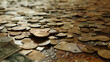 Close-up 45 degree field of view : Coins and banknotes lay scattered on many beige wooden tables.
