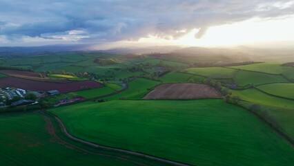Wall Mural - Sunset of Fields and Farms over Torquay from a drone,, Devon, England, Europe