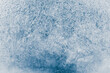 Ice texture crystal, blue tones background. Textured cold frosty surface of ice.