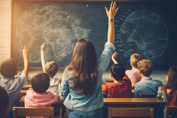 A teacher writing on a chalkboard while students eagerly raise their hands in a classroom, signaling the start of the Back to School season
