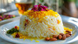 Authentic iranian saffron rice garnished with barberries, almonds, and aromatic herbs, accompanied by a cup of tea, embodying persian cuisine