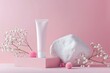 Elegant Skincare Tube on Pastel Pink Background with Floral Accents