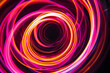© Neon Hub - Hypnotic neon vortex with swirling pink and orange patterns. Mesmerizing art on black background.