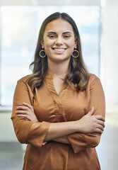 Canvas Print - Crossed arms, smile and portrait of business woman in office with positive, good and confident attitude. Pride, professional and female creative designer from Mexico with startup company in workplace