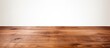 © HN Works - A brown wooden tabletop is situated on a white background with plenty of space for images. Creative banner. Copyspace image