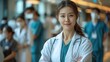 © Paworn - Young asia female doctor with a stethoscope, standing in a hospital corridor