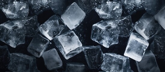 Leinwandbilder - This black background with ice crystal cubes offers ample copy space for text or design