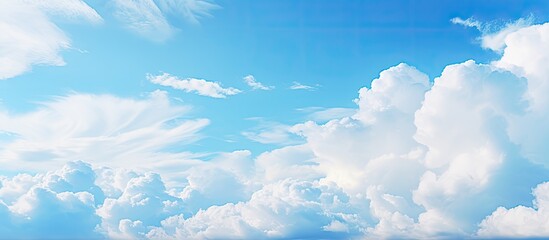 Aufkleber - Clouds provide a stunning contrast against the vivid blue sky creating a captivating image with ample copy space
